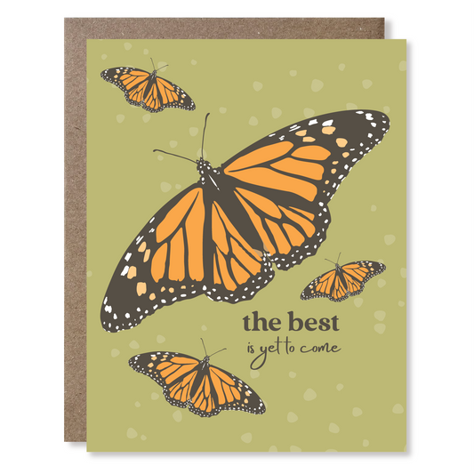 Greeting card with monarch butterfly design and text 'the best is yet to come' on a green background.