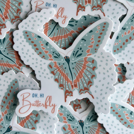 white background with blue and pink butterfly illustration and text that says oh hi, butterfly
