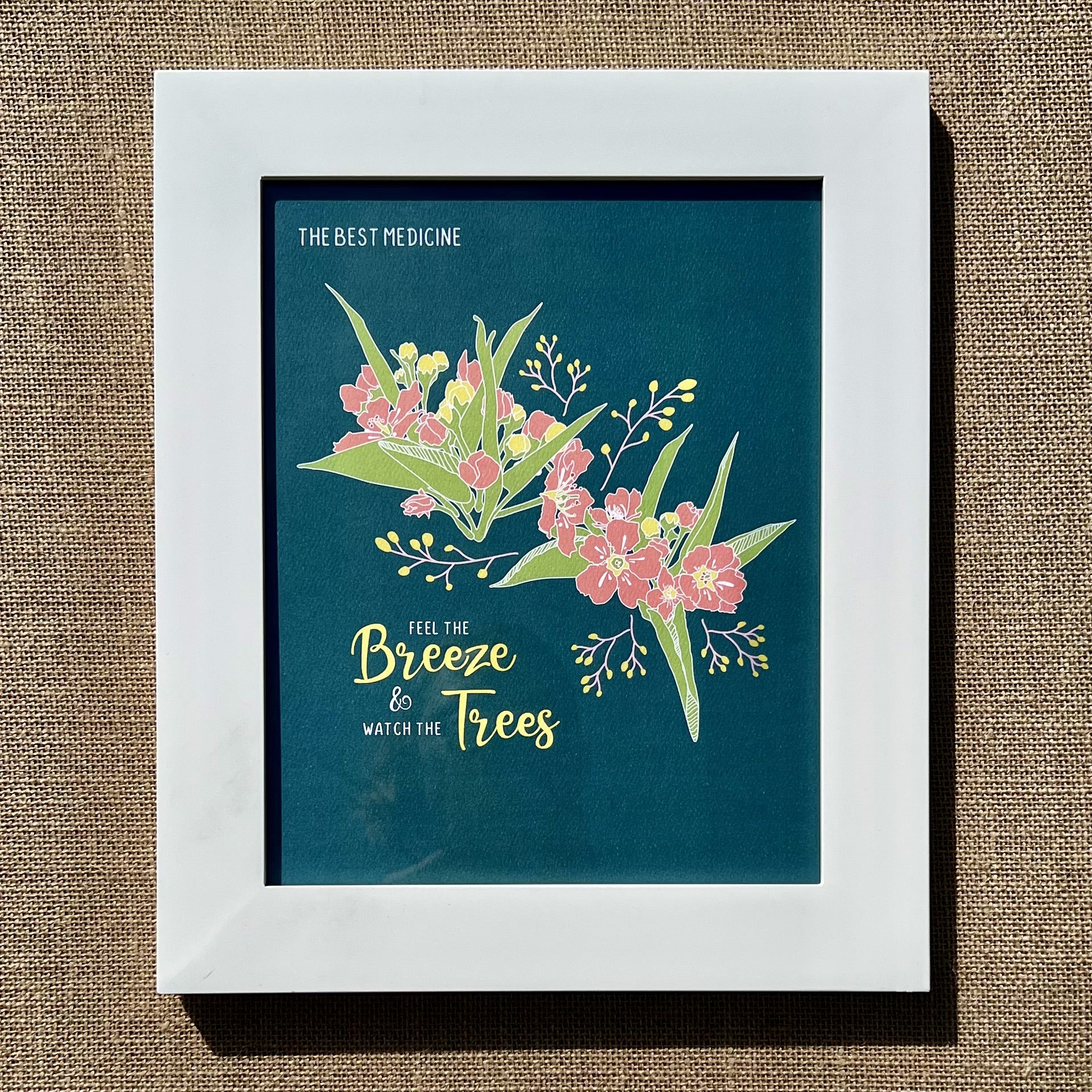 Framed 8x10 art print saying Feel the Breeze and Watch the Trees, with floral illustration