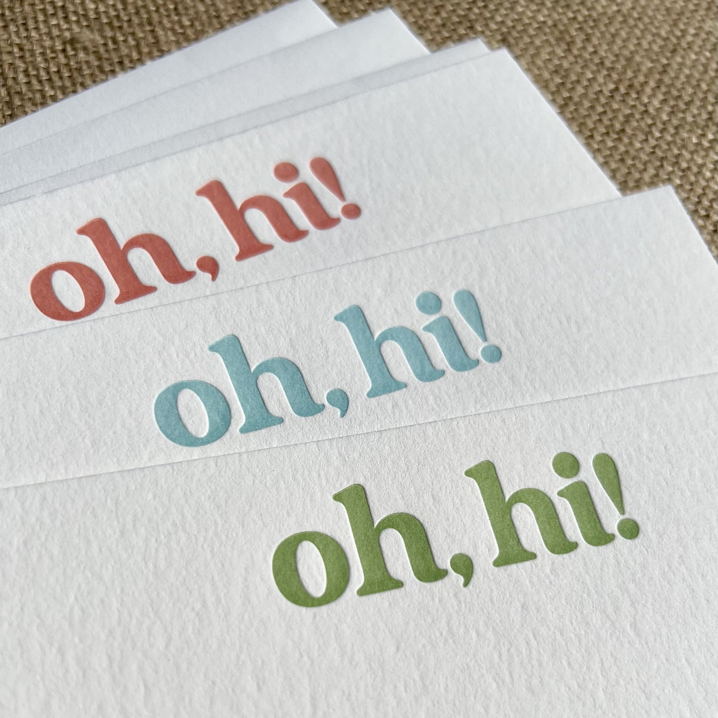 Closeup of letterpress notecards, showing de-bossed texture