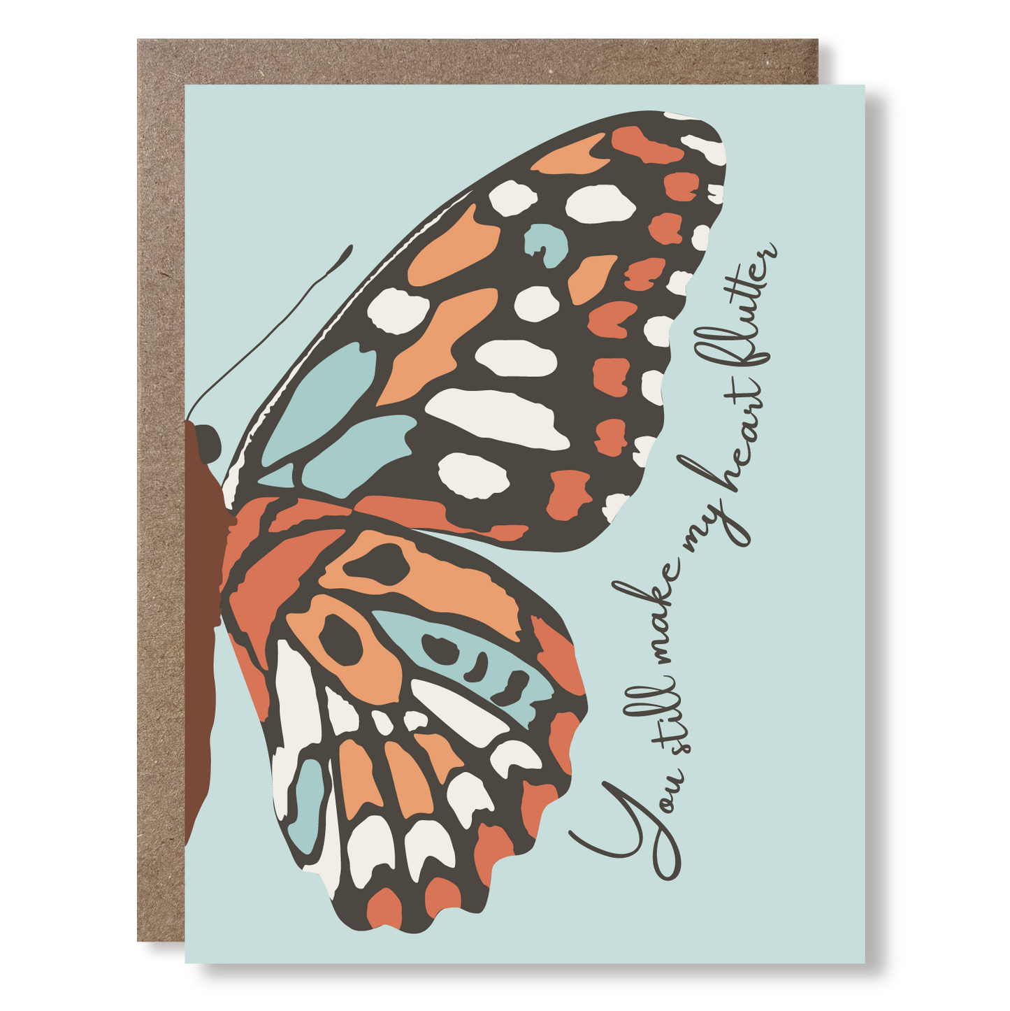 Greeting card with a pale blue background and giant half butterfly illustration, and text reading "You still make my heart flutter"
