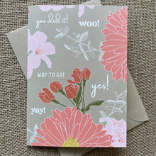 Load image into Gallery viewer, khaki background with warm pink tones in a flower print. White type says words like &quot;you did it!&quot; and &quot;Way to go!&quot; Shown with a kraft paper envelope
