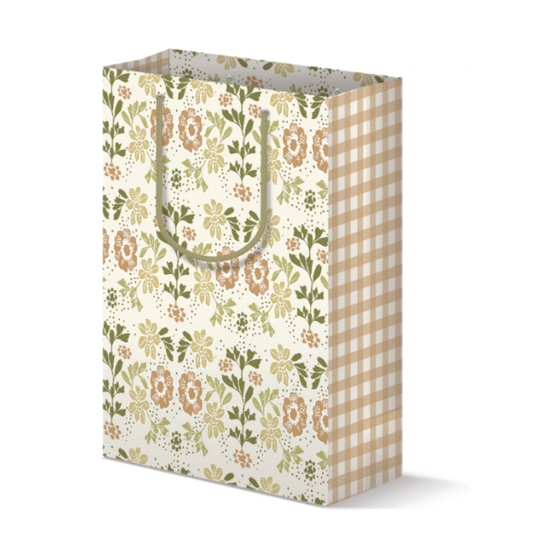 Gift bag with tan and green floral on the front and tan gingham plaid on the sides