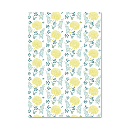 Patterned gift wrap sheet with blue and yellow floral pattern on a white background