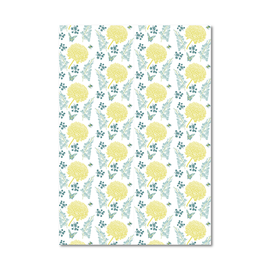 Patterned gift wrap sheet with blue and yellow floral pattern on a white background