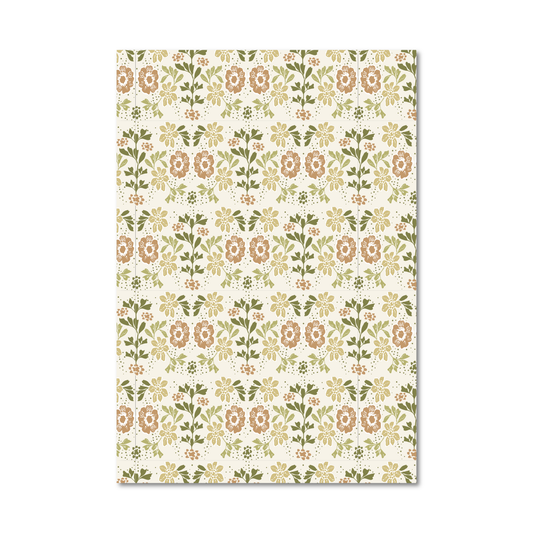 Patterned gift wrap sheet with a floral print in neutral shades of green, brown and cream