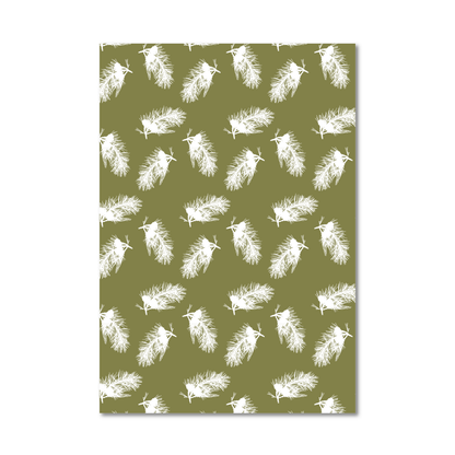 Gift wrap sheet featuring a repeating pattern of white stylized pine branch silhouettes on an olive green background, shown against a plain white backdrop.