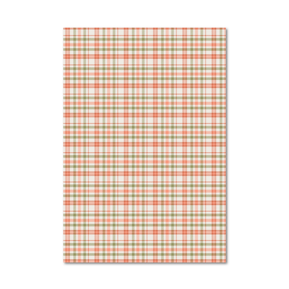 Gift wrap sheet with a plaid pattern in peach, sage green, and off-white, shown flat against a white background.