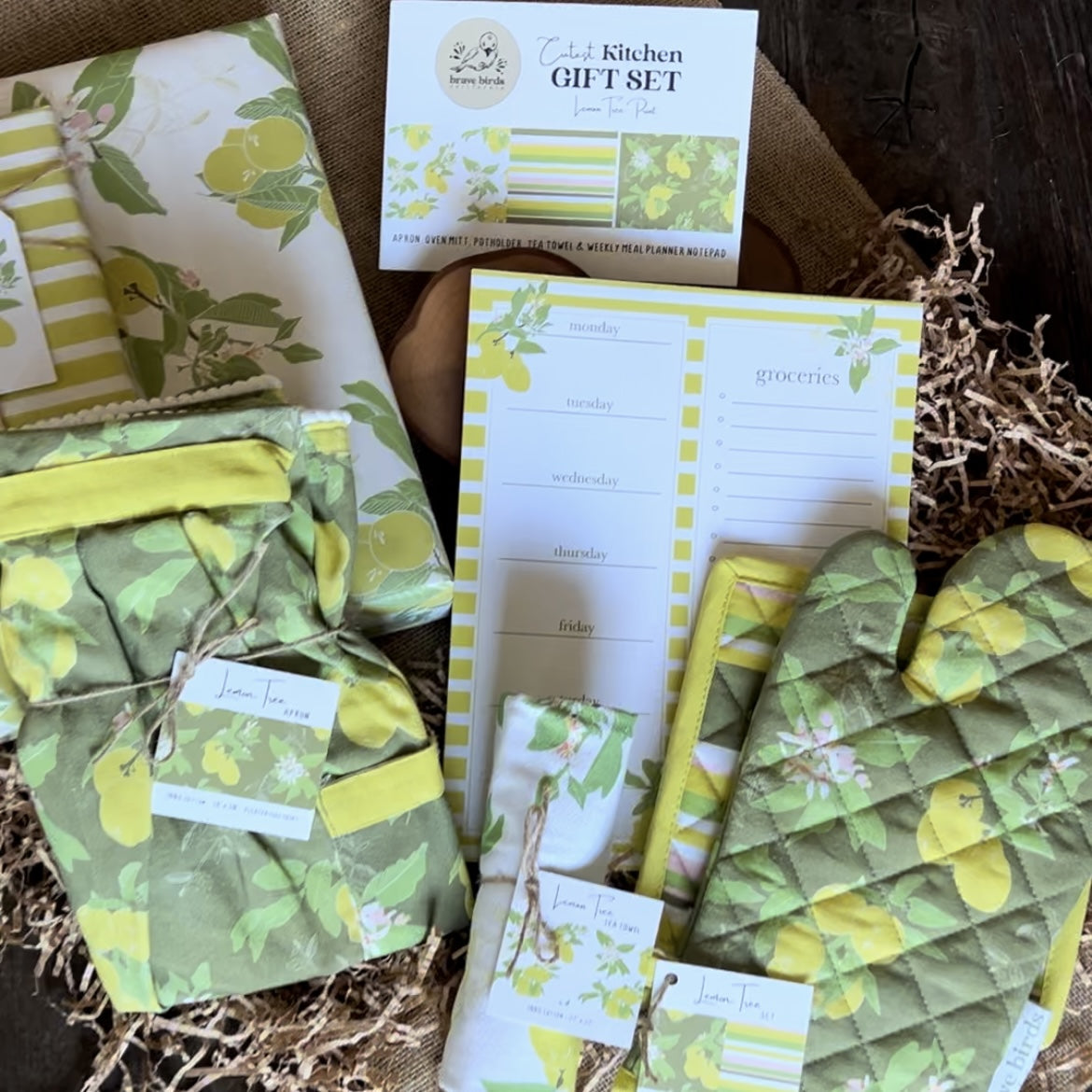 Group of Lemon print kitchen textiles in a gift setup