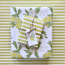 Load image into Gallery viewer, 2 gift boxes, wrapped in lemon print side and in citron strips side, tied with twine and a lemon pring gift tag
