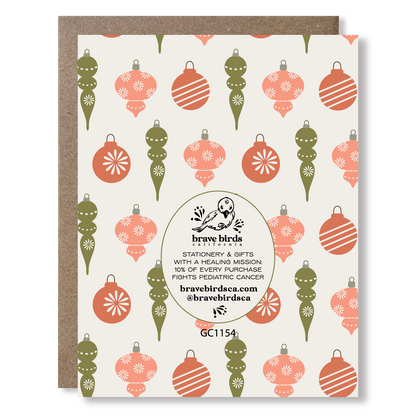 Greeting card with Christmas ornament pattern and brand logo with text that reads 'stationery & gifts with a healing mission: 10% of every purchase fights pediatric cancer