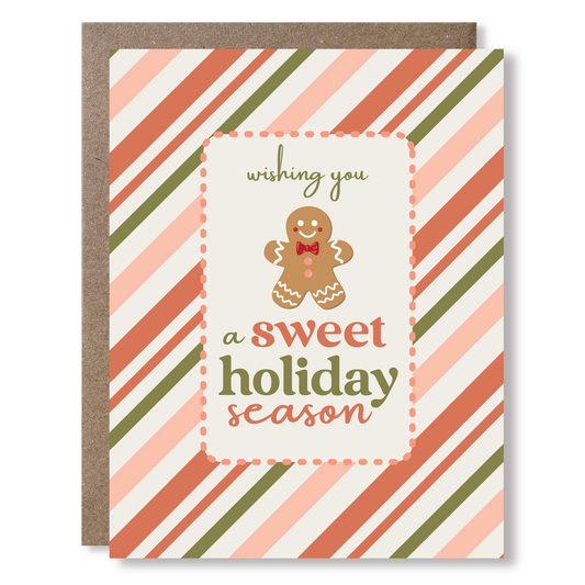 Greeting card with a gingerbread man and stripes, with text reading 'wishing yo ua sweet holiday season'
