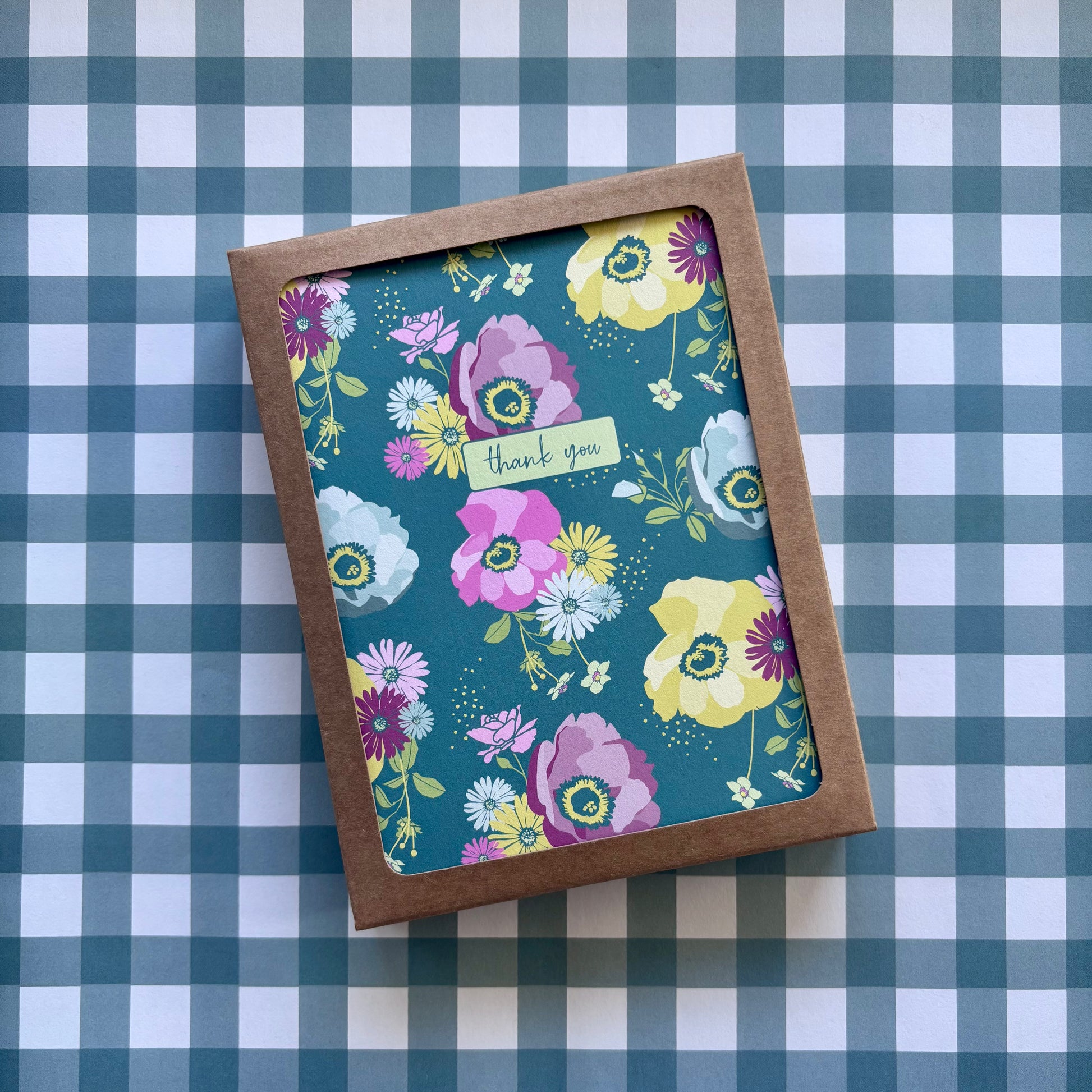 Box of greeting cards with colorful floral print and the words thank you