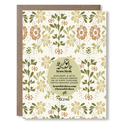 Back view of a greeting card with brand information reading "Brave Birds California, stationery & gifts with a healing mission: 10% of every purchase fights pediatric cancer" 