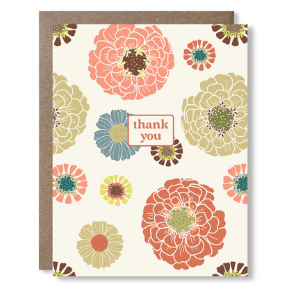 greeting card with colorful flowers on a cream background and text reading "thank you"