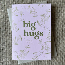Load image into Gallery viewer, pale pink card with olive green branch and leaf illustrations and bold text saying big hugs
