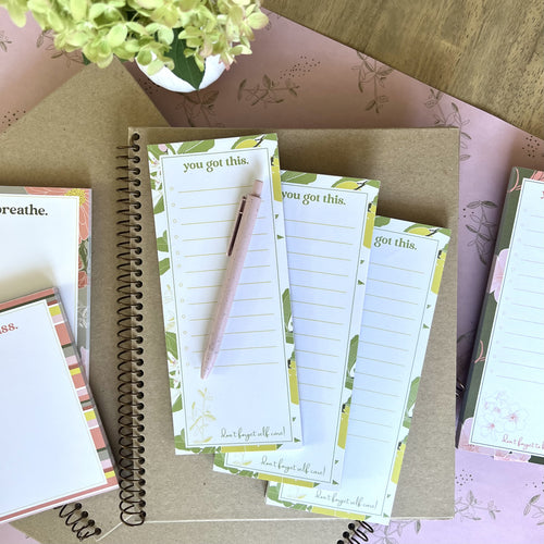 3 you got this notepads styles with a pink pen and other stationery items